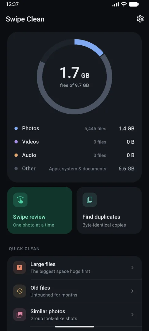 The home screen: a storage ring showing 1.7 GB free of 9.7 GB, space used by photos, videos and audio, and the cleaning tools below